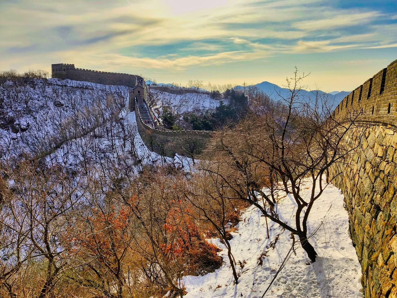 The Mutianyu section of the Great Wall running along a forested ridgeline northeast of Beijing